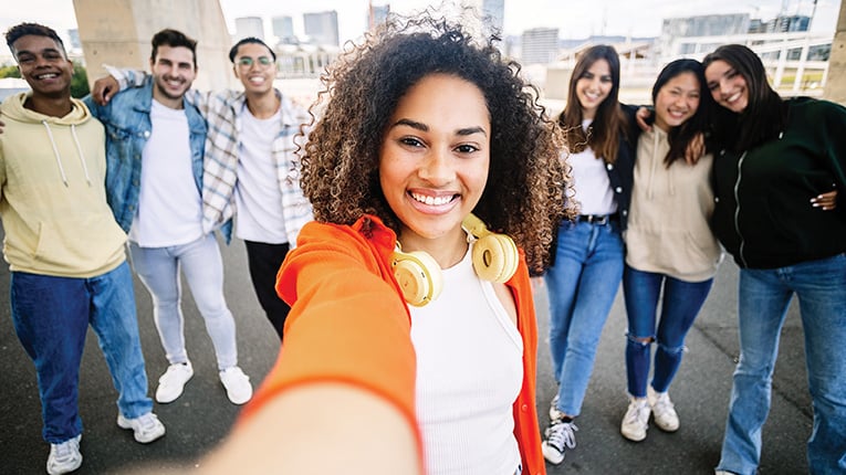 Diverse university friends taking a selfie