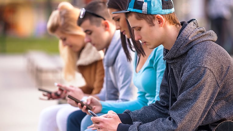 Teenagers Using Mobile Phones